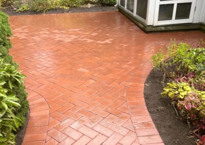 Expert 45-Degree Herringbone Patio Installation in Manchester, MA: Elevate your outdoor space with our professional hardscaping services. Our skilled team specializes in creating stunning and intricate herringbone pattern patios to enhance your property's aesthetics and functionality. Contact us today for a consultation!
