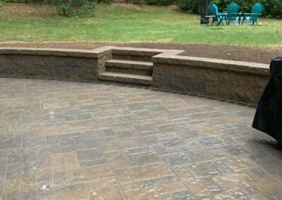 Expert Patio and Landscape Wall with Steps Installation in Wilmington, MA: Transform your outdoor space with our professional hardscaping services. Our skilled team specializes in creating beautiful and functional outdoor living areas, including patios and landscape walls with steps. Contact us today for a consultation!