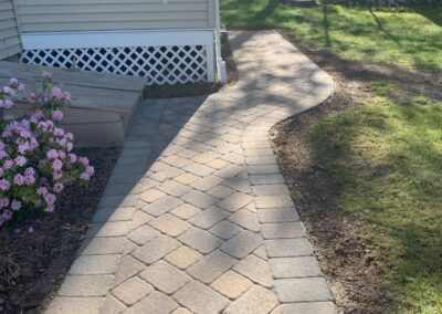 Professional Paver Walkway Installation in Reading, MA: Enhance your outdoor space with our expert hardscaping services. Our skilled team specializes in installing durable and stylish paver walkways to elevate your property's aesthetics and functionality. Contact us today for a consultation!