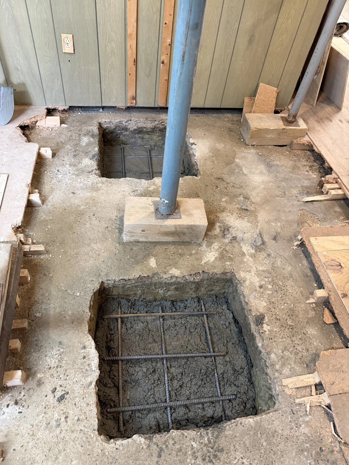 Rebar grid inside an excavated basement column footing
